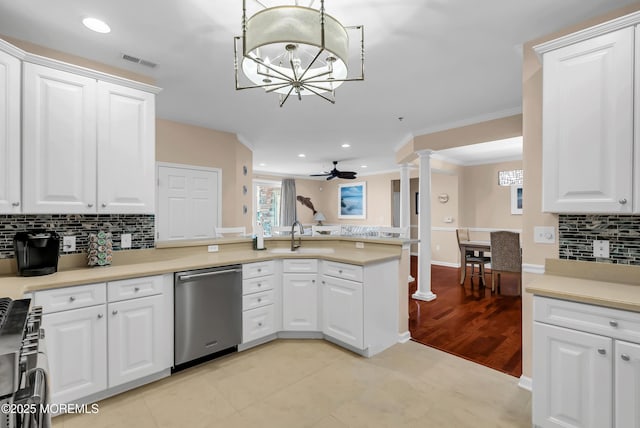 kitchen with appliances with stainless steel finishes, decorative light fixtures, decorative columns, white cabinetry, and kitchen peninsula