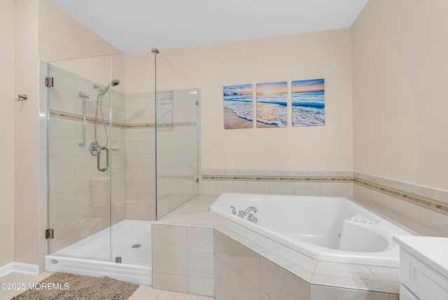 bathroom featuring vanity, tile patterned flooring, and separate shower and tub