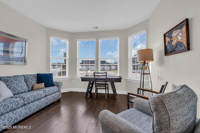 living room with dark hardwood / wood-style floors