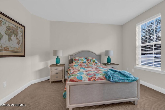 bedroom featuring light carpet