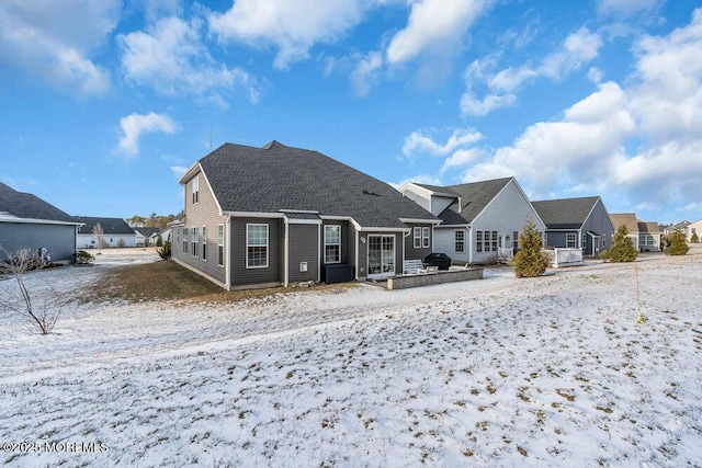 view of snow covered property