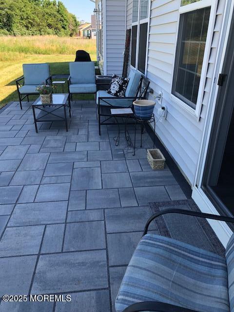 view of patio / terrace featuring an outdoor living space