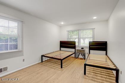 living area featuring hardwood / wood-style floors