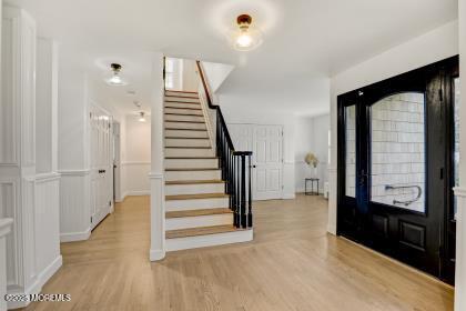 entrance foyer featuring light hardwood / wood-style flooring