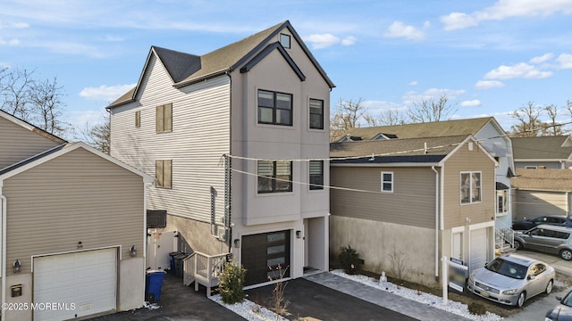 view of home's exterior with a garage