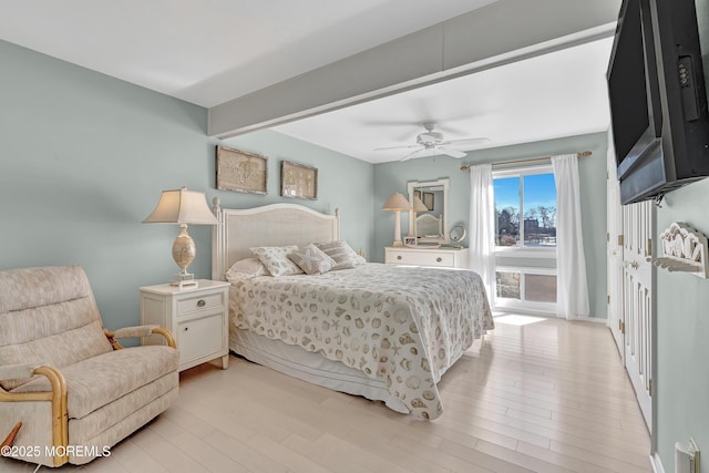 bedroom featuring ceiling fan and light wood-type flooring