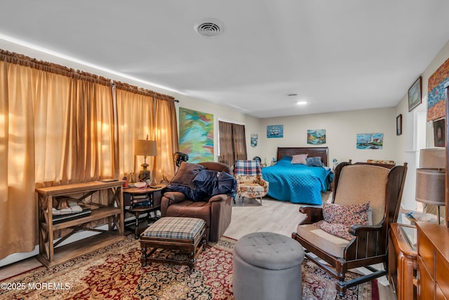 bedroom featuring hardwood / wood-style floors