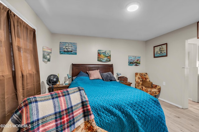 bedroom with light hardwood / wood-style flooring