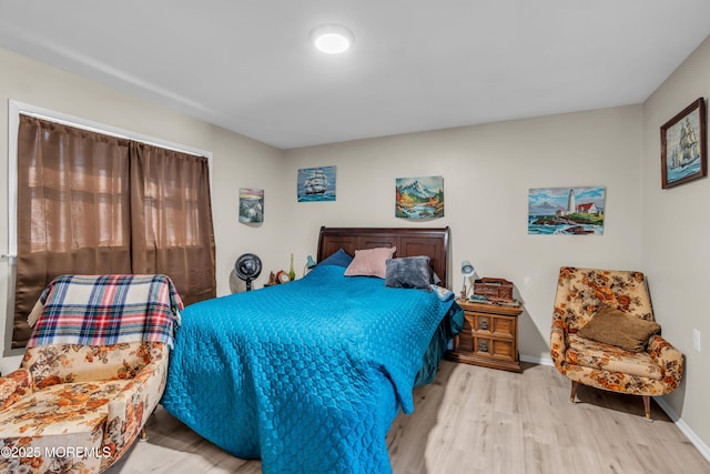 bedroom with light hardwood / wood-style floors