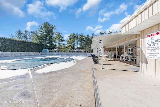 view of swimming pool featuring a patio