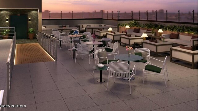 view of patio / terrace featuring an outdoor living space and outdoor dining area