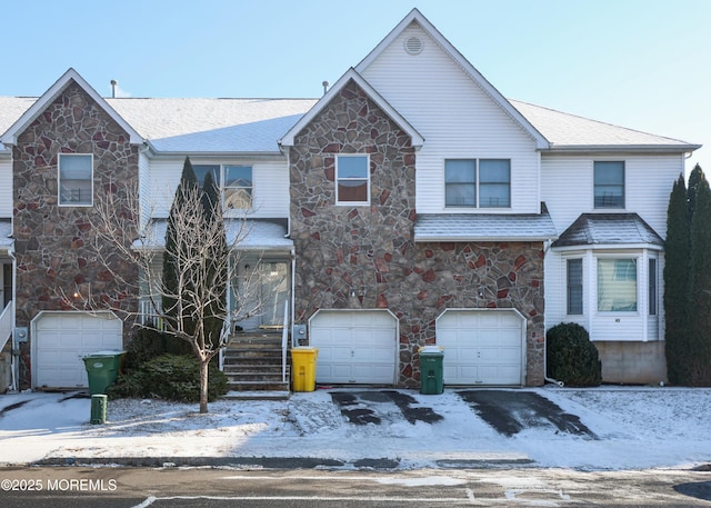 front of property with a garage