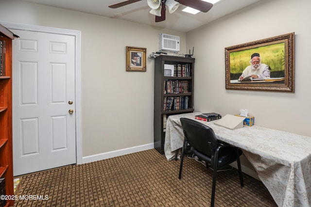 office area with ceiling fan, a wall mounted AC, and dark colored carpet