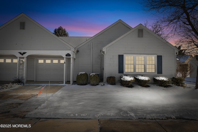 single story home with a garage