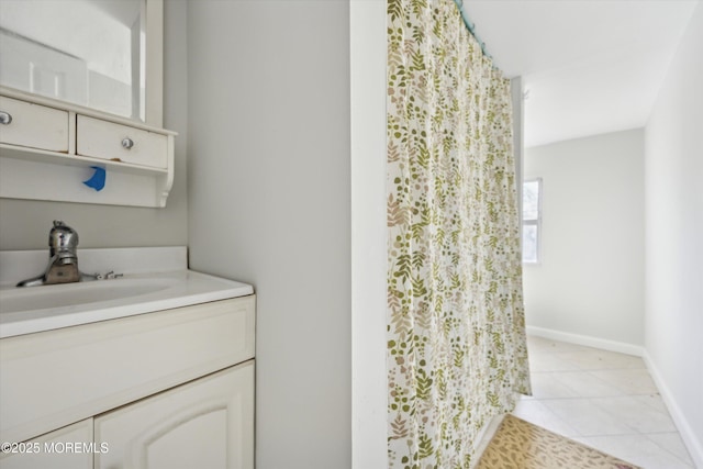 bathroom featuring tile patterned floors and vanity