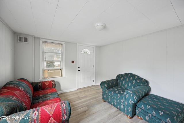 living room with hardwood / wood-style flooring