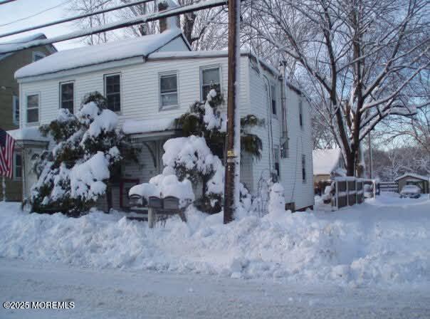 view of snow covered property