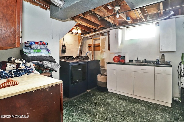 laundry room featuring sink and washing machine and clothes dryer