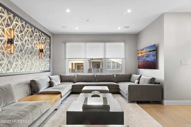 living room with light hardwood / wood-style flooring