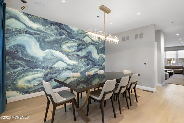 dining area with light wood-type flooring