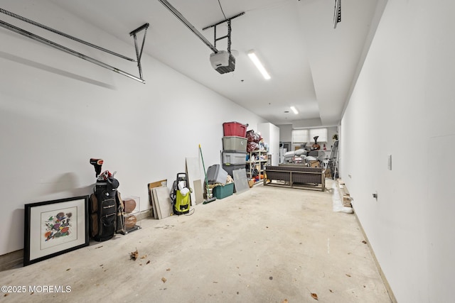 garage featuring a garage door opener