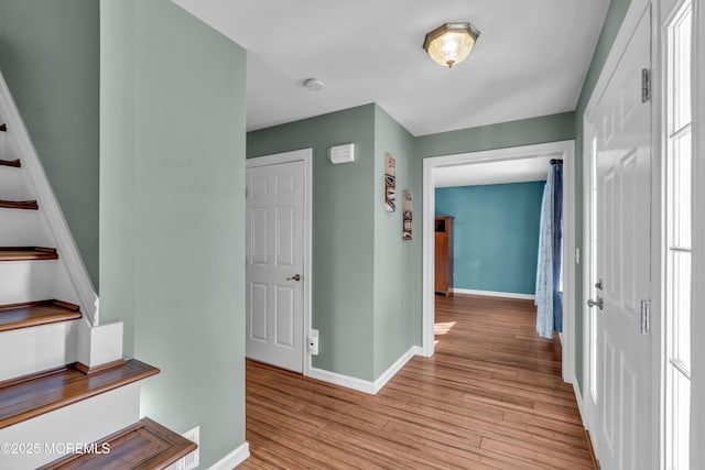 foyer entrance featuring light wood-type flooring