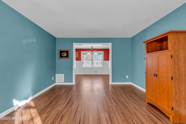 spare room featuring light wood-type flooring