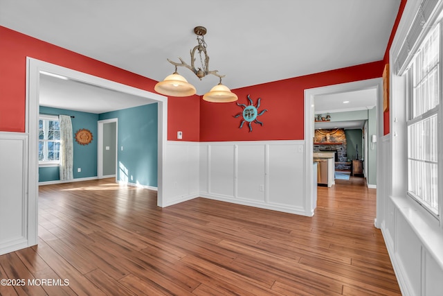 spare room with hardwood / wood-style floors