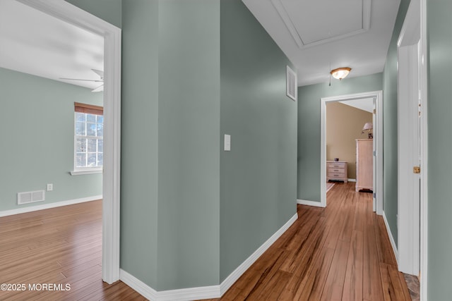 hallway featuring hardwood / wood-style floors