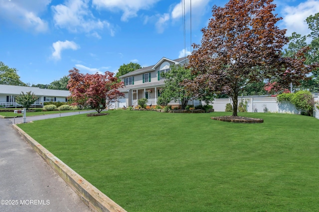 view of front facade with a front lawn