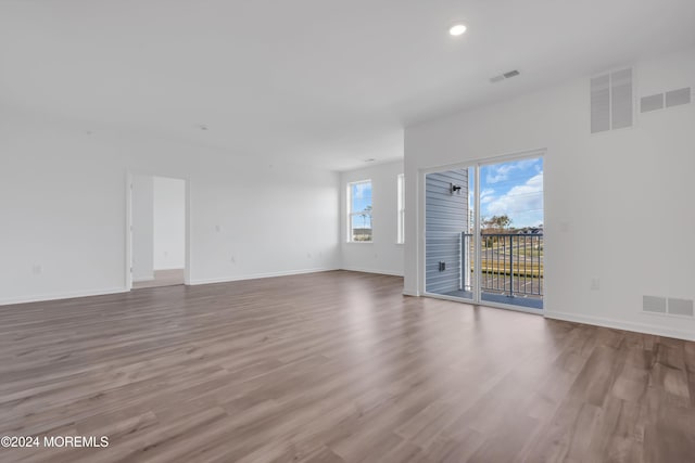 spare room with light hardwood / wood-style flooring