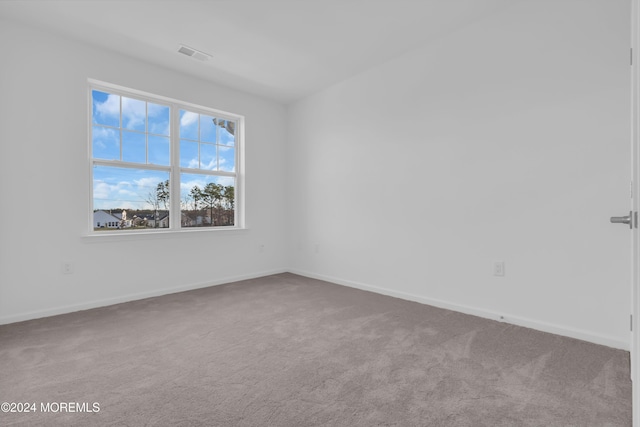 empty room featuring carpet floors