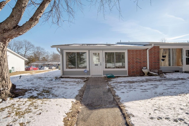 view of front of property with brick siding