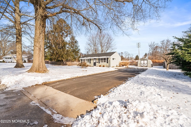 view of front facade with a shed