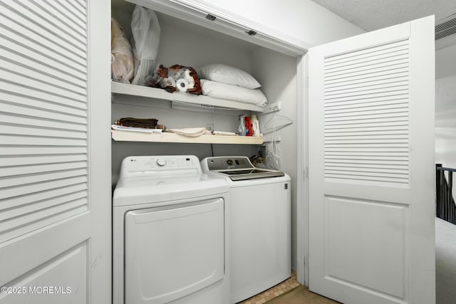 laundry area featuring separate washer and dryer