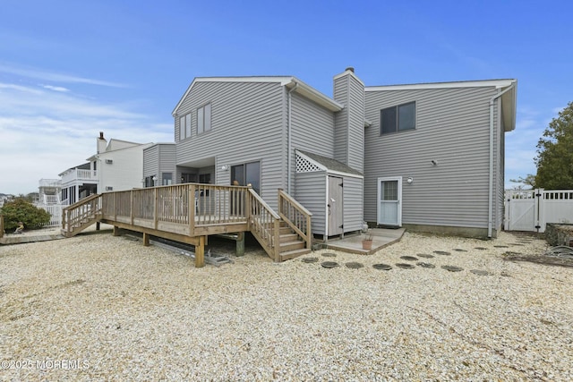 rear view of property with a deck