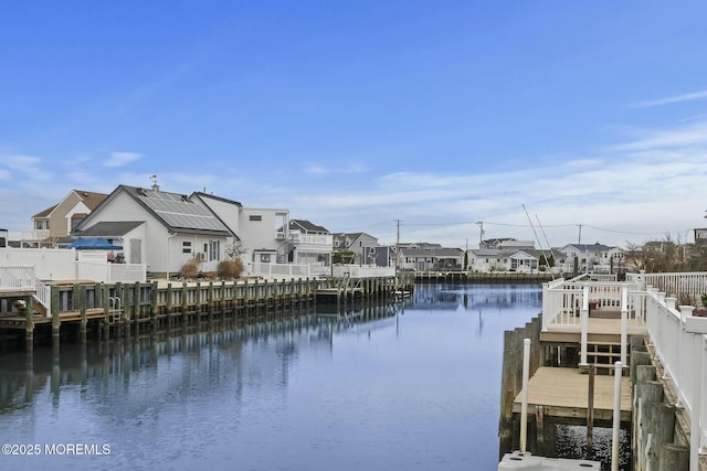 dock area with a water view