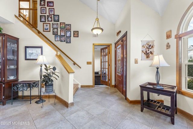 18 Tall Oaks Ct, Old Bridge, NJ 08857 - entryway featuring stairs, baseboards, and high vaulted ceiling