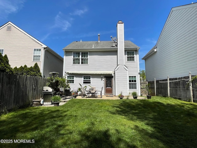 18 Tall Oaks Ct, Old Bridge, NJ 08857 - back of house featuring a chimney and a patio area