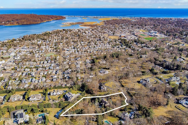 drone / aerial view featuring a water view