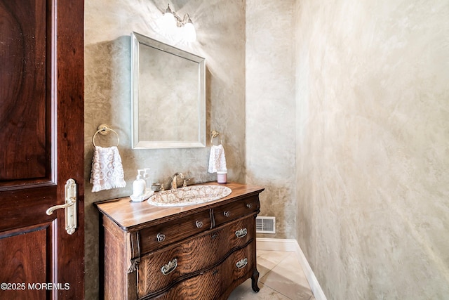 bathroom featuring vanity and tile patterned flooring