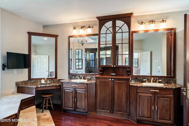 bathroom featuring hardwood / wood-style flooring and vanity