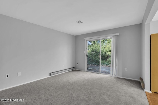 carpeted empty room with a baseboard radiator