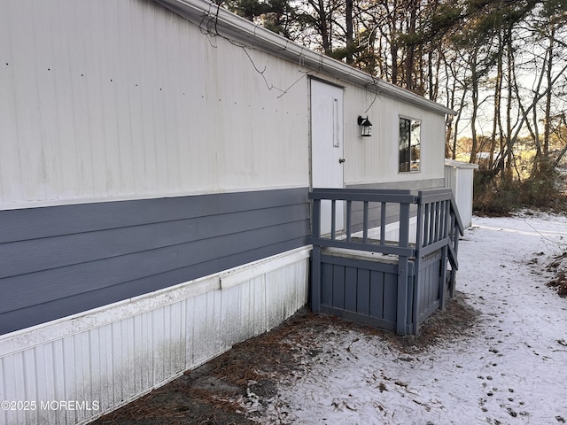 view of snow covered property