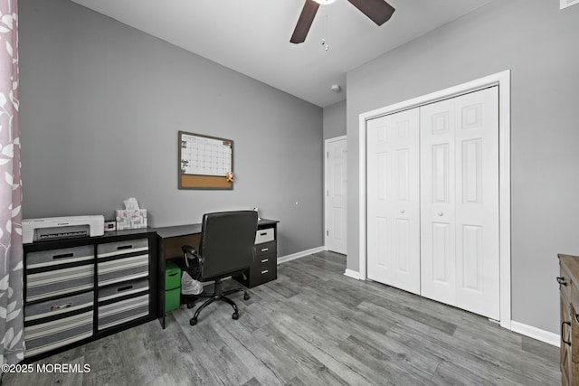 office space with hardwood / wood-style flooring and ceiling fan