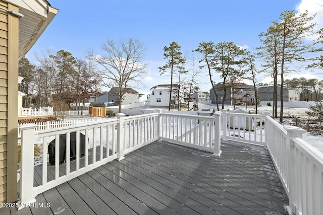 view of snow covered deck