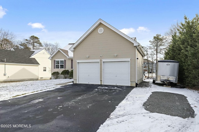 exterior space with a garage