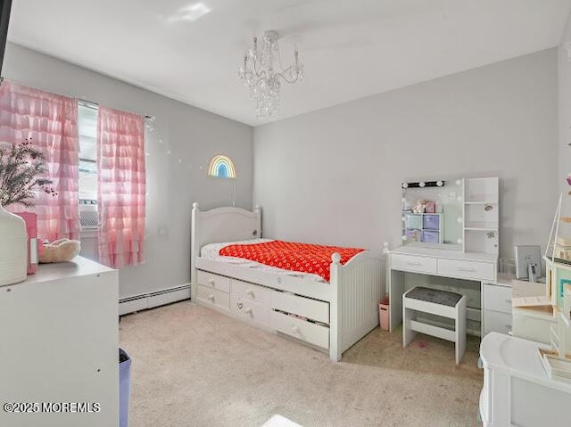 carpeted bedroom featuring a baseboard radiator and a chandelier