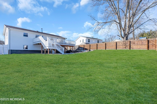 view of yard with a wooden deck