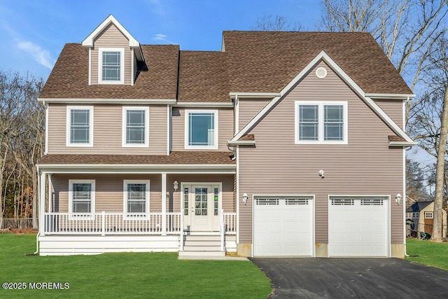 119 Law-Win Ct, Brick, NJ 08723 - view of front of house with a front yard, covered porch, aphalt driveway, and an attached garage